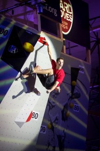 Ruben topping his super-final boulder above water in the "Schwimming Opera" of Wuppertal in the HardMoves Boulderleague event